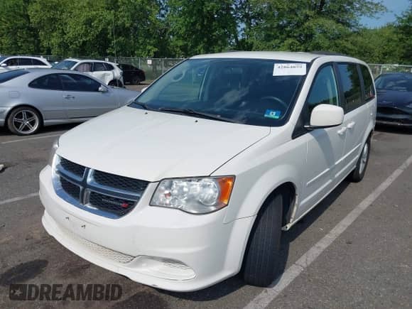 2013 Dodge Grand Caravan SXT with VIN 2C4RDGCG6DR748485, listed as a IAAI auction lot 42864859 with 196,166 mi miles and . Bid and sale history available at DreamBid. Image 2.