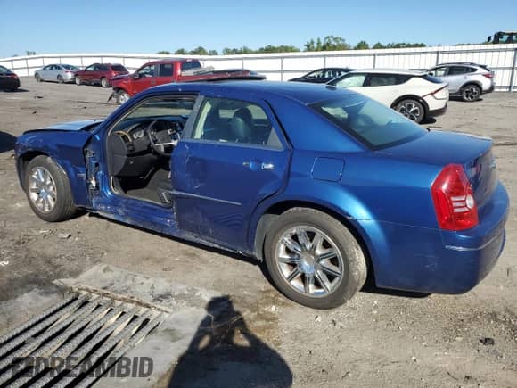 2010 Chrysler 300 Touring Signature with VIN 2C3CA5CVXAH126690, listed as a Copart auction lot 69280384 with 239,267 mi miles and Salvage title. Bid and sale history available at DreamBid. Image 2.