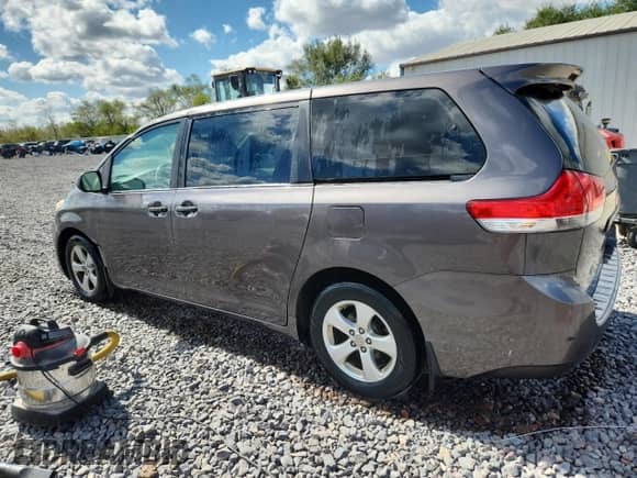 2012 Toyota Sienna with VIN 5TDZK3DCXCS233781, listed as a Copart auction lot 82167325 with 183,332 mi miles and Salvage title. Bid and sale history available at DreamBid. Image 2.
