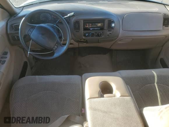 1999 Ford F-150 с VIN 1FTRX17W3XNA82872, выставлен на аукционе Copart как лот 85876295 с пробегом Не указан миль и Списание • Salvage title. История ставок и продаж доступна на DreamBid. Изображение 8.
