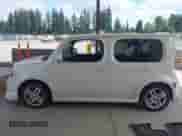 2009 Nissan Cube SL с VIN JN8AZ28R59T114567, выставлен на аукционе IAAI как лот 42594407 с пробегом 143 808 миль миль и . История ставок и продаж доступна на DreamBid. Изображение 14.