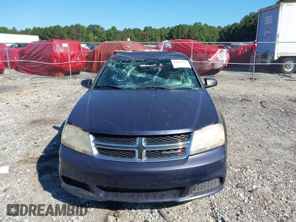 2013 Dodge Avenger SE with VIN 1C3CDZAB4DN638531, listed as a IAAI auction lot 43091142 with 167,701 mi miles and . Bid and sale history available at DreamBid. Image 12.