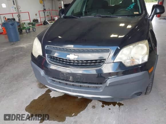 2014 Chevrolet Captiva Sport LS z VIN 3GNAL2EK9ES546563, wystawiony jako IAAI lot #43058779 z przebiegiem 171 269 mil mil oraz . Historia ofert i sprzedaży dostępna na DreamBid. Obrazek 6.