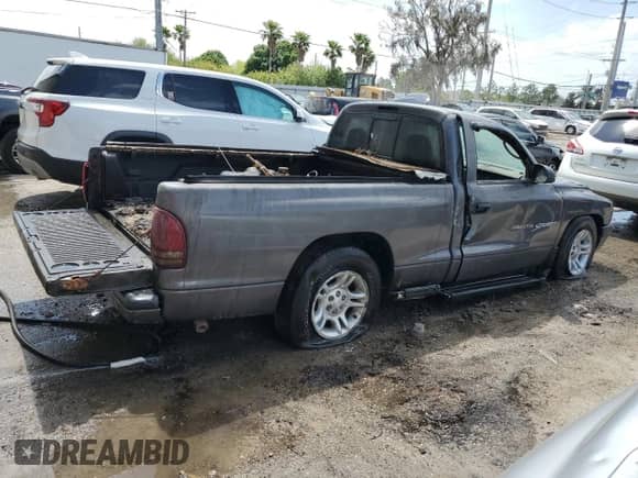2001 Dodge Dakota с VIN 1B7FL26X21S343416, выставлен на аукционе Copart как лот 48143584 с пробегом Не указан миль и На запчасти • Non repairable. История ставок и продаж доступна на DreamBid. Изображение 3.