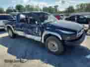 2004 Dodge Dakota SLT with VIN 1D7HL48N74S651434, listed as a Copart auction lot 64309615 with 186,134 mi miles and Salvage title. Bid and sale history available at DreamBid. Image 4.