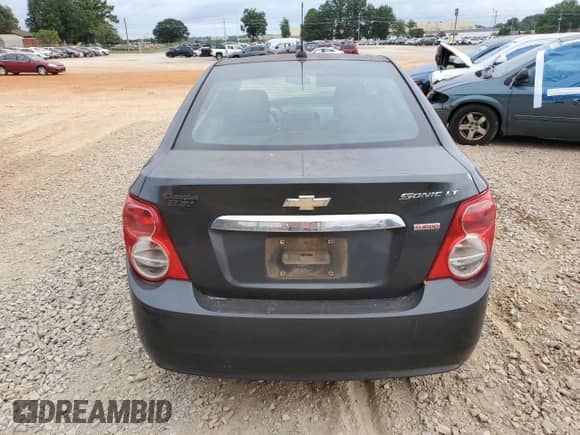 2016 Chevrolet Sonic LT z VIN 1G1JC5SB8G4179164, wystawiony jako Copart lot #68324365 z przebiegiem 124 800 mil mil oraz Szkoda całkowita • Salvage title. Historia ofert i sprzedaży dostępna na DreamBid. Obrazek 6.