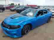 2023 Dodge Charger R/T z VIN 2C3CDXCT7PH612318, wystawiony jako IAAI lot #43021076 z przebiegiem 62 888 mil mil oraz . Historia ofert i sprzedaży dostępna na DreamBid. Obrazek 2.