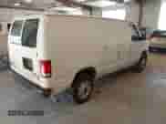 2014 Ford Econoline Cargo Commercial with VIN 1FTNE2EW8EDA09190, listed as a IAAI auction lot 42655816 with 212,534 mi miles and . Bid and sale history available at DreamBid. Image 4.