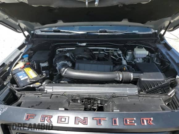 2023 Nissan Frontier SV z VIN 1N6ED1EJ1PN618570, wystawiony jako Copart lot #80138165 z przebiegiem 29 890 mil mil oraz Szkoda całkowita • Salvage title. Historia ofert i sprzedaży dostępna na DreamBid. Obrazek 11.