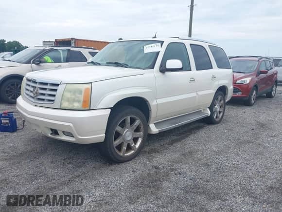 2005 Cadillac Escalade with VIN 1GYEK63N45R140494, listed as a IAAI auction lot 42742134 with 193,360 mi miles and . Bid and sale history available at DreamBid. Image 2.