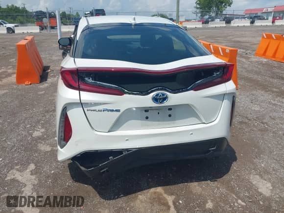 2018 Toyota Prius Plus z VIN JTDKARFP5J3070415, wystawiony jako IAAI lot #42701325 z przebiegiem 77 529 mil mil oraz . Historia ofert i sprzedaży dostępna na DreamBid. Obrazek 16.
