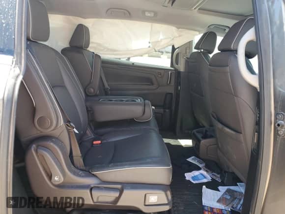 2023 Honda Odyssey Elite с VIN 5FNRL6H97PB009312, выставлен на аукционе Copart как лот 69395615 с пробегом Не указан миль и Списание • Salvage title. История ставок и продаж доступна на DreamBid. Изображение 11.