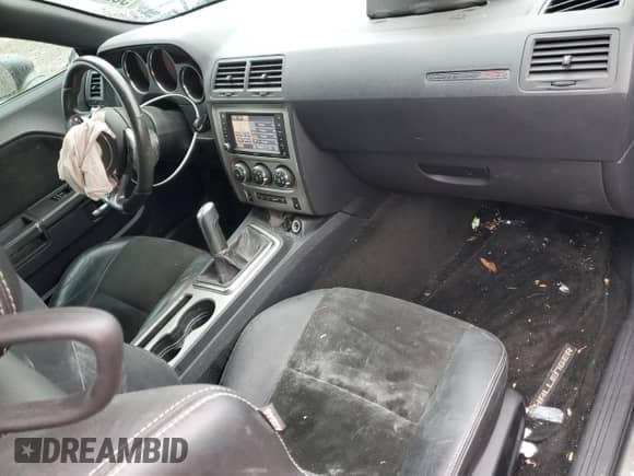 2012 Dodge Challenger SRT-8 392 с VIN 2C3CDYCJ9CH229723, выставлен на аукционе Copart как лот 55267885 с пробегом 62 056 миль миль и Списание • Salvage title. История ставок и продаж доступна на DreamBid. Изображение 8.