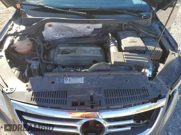 2011 Volkswagen Tiguan S с VIN WVGBV7AX9BW513693, выставлен на аукционе Copart как лот 82323815 с пробегом 116 656 миль миль и Списание • Salvage title. История ставок и продаж доступна на DreamBid. Изображение 12.