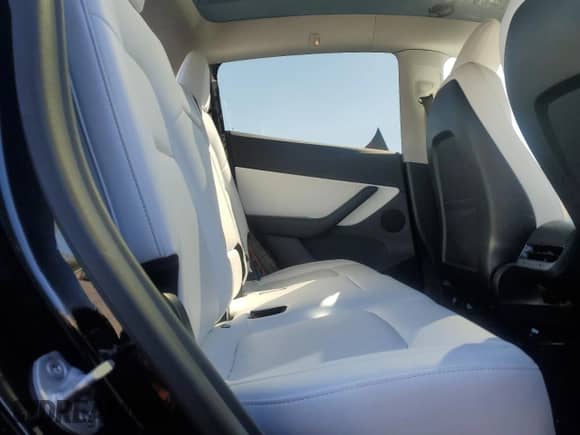 2021 Tesla Model Y Long Range z VIN 5YJYGDEEXMF068761, wystawiony jako Copart lot #71468415 z przebiegiem 50 709 mil mil oraz Szkoda całkowita • Salvage title. Historia ofert i sprzedaży dostępna na DreamBid. Obrazek 10.