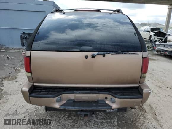 2005 Chevrolet Blazer z VIN 1GNCS18X25K100845, wystawiony jako Copart lot #45736755 z przebiegiem 159 767 mil mil oraz Szkoda całkowita • Salvage title. Historia ofert i sprzedaży dostępna na DreamBid. Obrazek 6.