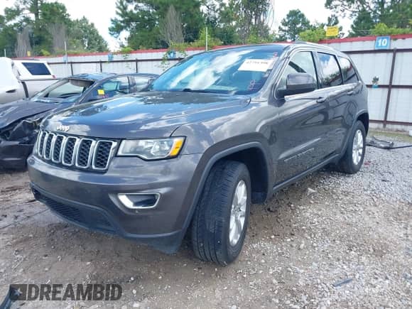 2021 Jeep Grand Cherokee Laredo E with VIN 1C4RJEAG0MC539655, listed as a IAAI auction lot 42791398 with 89,124 mi miles and . Bid and sale history available at DreamBid. Image 17.