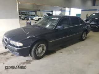 2001 BMW 7 Series 740iL with VIN WBAGH83461DP21421, listed as a Copart auction lot 84357185 with 233,065 mi miles and Clean title. Bid and sale history available at DreamBid. Image 1.