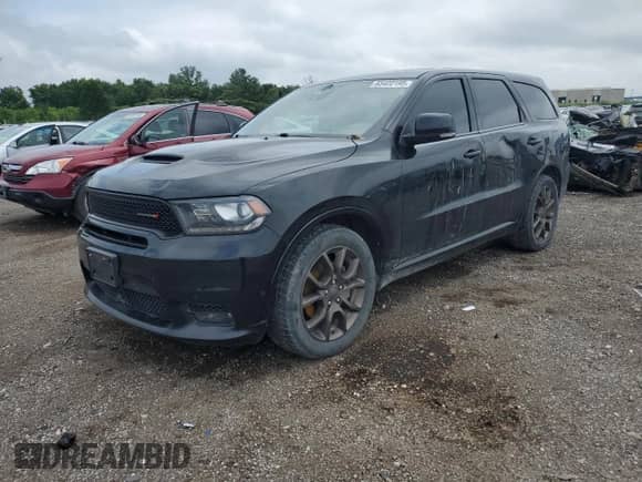 2018 Dodge Durango R/T with VIN 1C4SDJCT8JC327948, listed as a Copart auction lot 65422195 with 104,555 mi miles and Salvage title. Bid and sale history available at DreamBid. Image 1.