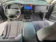 2002 Dodge Dakota Sport with VIN 1B7HL38X32S700728, listed as a Copart auction lot 89494295 with 251,036 mi miles and Salvage title. Bid and sale history available at DreamBid. Image 8.