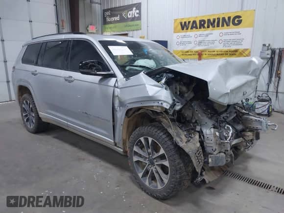 2021 Jeep Grand Cherokee Overland with VIN 1C4RJKDG3M8119823, listed as a IAAI auction lot 42163425 with 54,560 mi miles and . Bid and sale history available at DreamBid. Image 1.