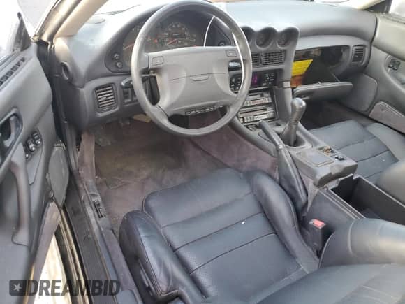1992 Dodge Stealth with VIN JB3XE74C4NY050195, listed as a Copart auction lot 79440874 with 49,979 mi miles and Salvage title. Bid and sale history available at DreamBid. Image 8.