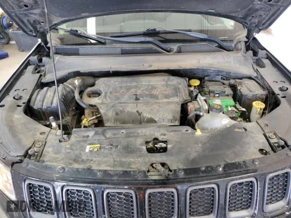 2017 Jeep Compass Trailhawk with VIN 3C4NJDDBXHT647011, listed as a Copart auction lot 65583185 with 106,438 mi miles and Salvage title. Bid and sale history available at DreamBid. Image 12.