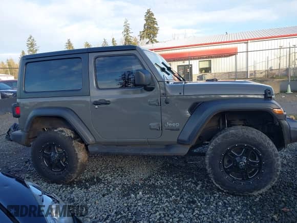2019 Jeep Wrangler Sport S with VIN 1C4GJXAG3KW518815, listed as a IAAI auction lot 40689483 with 97,268 mi miles and . Bid and sale history available at DreamBid. Image 13.
