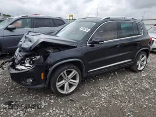 2014 Volkswagen Tiguan SEL with VIN WVGAV3AX7EW101796, listed as a Copart auction lot 60904345 with 97,652 mi miles and Salvage title. Bid and sale history available at DreamBid. Image 1.