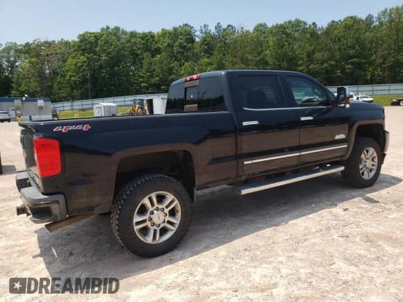 2015 Chevrolet Silverado 2500HD High Country с VIN 1GC1KXEG1FF620567, выставлен на аукционе Copart как лот 59094405 с пробегом 75 143 миль миль и Списание • Salvage title. История ставок и продаж доступна на DreamBid. Изображение 3.