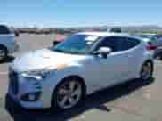 2013 Hyundai Veloster Turbo с VIN KMHTC6AE0DU177983, выставлен на аукционе IAAI как лот 42292102 с пробегом 121 142 миль миль и . История ставок и продаж доступна на DreamBid. Изображение 2.