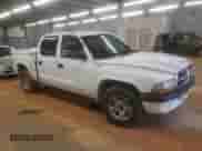 2004 Dodge Dakota Sport z VIN 1D7HL38NX4S579316, wystawiony jako Copart lot #68731865 z przebiegiem 183 085 mil mil oraz Szkoda całkowita • Salvage title. Historia ofert i sprzedaży dostępna na DreamBid. Obrazek 4.