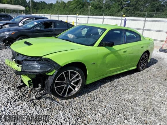 2023 Dodge Charger R/T with VIN 2C3CDXCT3PH534362, listed as a Copart auction lot 65559795 with 56,268 mi miles and Salvage title. Bid and sale history available at DreamBid. Image 1.