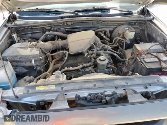 2015 Toyota Tacoma PreRunner z VIN 5TFTX4GN4FX049090, wystawiony jako Copart lot #64138665 z przebiegiem 197 342 mil mil oraz Szkoda całkowita • Salvage title. Historia ofert i sprzedaży dostępna na DreamBid. Obrazek 11.