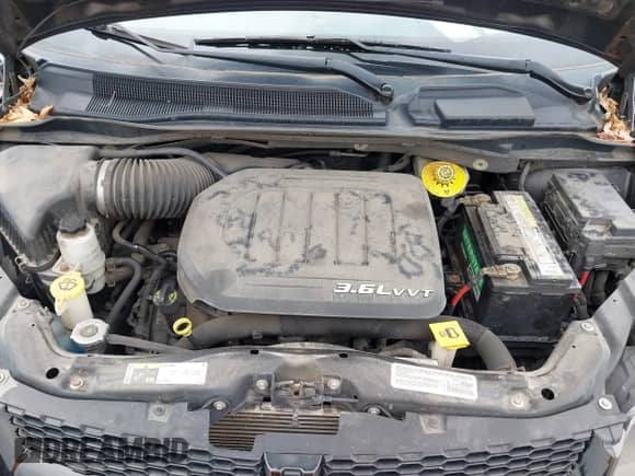 2014 Dodge Grand Caravan SE with VIN 2C4RDGBG7ER361821, listed as a IAAI auction lot 42919043 with 211,735 mi miles and . Bid and sale history available at DreamBid. Image 10.