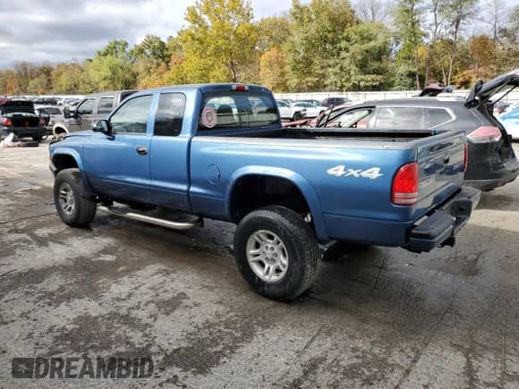 2004 Dodge Dakota Sport with VIN 1D7HG32N04S552610, listed as a Copart auction lot 75866434 with 157,090 mi miles and Salvage title. Bid and sale history available at DreamBid. Image 2.
