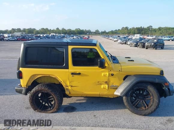 2019 Jeep Wrangler Sport S with VIN 1C4GJXAG6KW508134, listed as a IAAI auction lot 42116949 with 47,077 mi miles and . Bid and sale history available at DreamBid. Image 13.