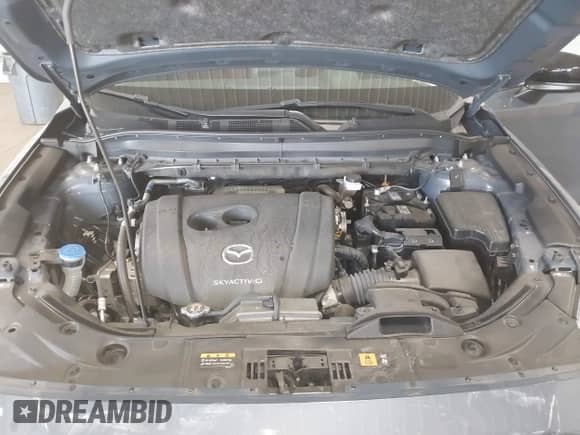 2023 Mazda CX-5 S Carbon Edition z VIN JM3KFBCM8P0261086, wystawiony jako IAAI lot #42215690 z przebiegiem 23 730 mil mil oraz . Historia ofert i sprzedaży dostępna na DreamBid. Obrazek 10.