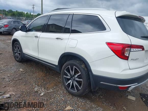 2019 Honda Pilot Touring 7-Passenger z VIN 5FNYF6H63KB078886, wystawiony jako IAAI lot #42504172 z przebiegiem 87 662 mil mil oraz . Historia ofert i sprzedaży dostępna na DreamBid. Obrazek 3.