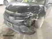 2020 Toyota Camry LE z VIN 4T1C11AKXLU363530, wystawiony jako IAAI lot #41670307 z przebiegiem 86 459 mil mil oraz . Historia ofert i sprzedaży dostępna na DreamBid. Obrazek 6.