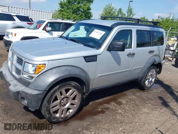 2011 Dodge Nitro Heat with VIN 1D4PT4GX5BW500318, listed as a IAAI auction lot 42602440 with 163,836 mi miles and . Bid and sale history available at DreamBid. Image 14.