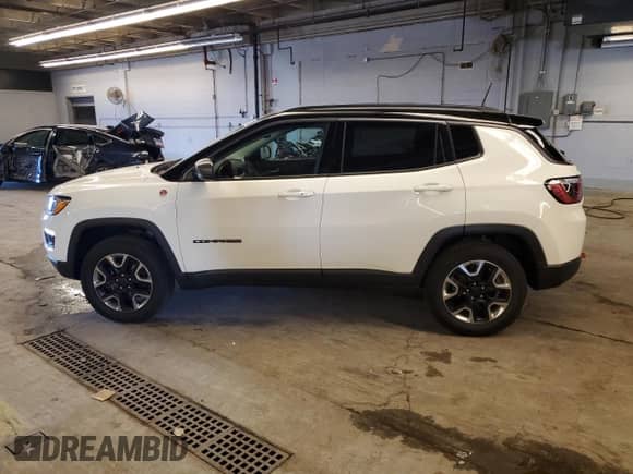 2018 Jeep Compass Trailhawk с VIN 3C4NJDDB0JT163497, выставлен на аукционе Copart как лот 77000364 с пробегом 28 681 миль миль и Списание • Salvage title. История ставок и продаж доступна на DreamBid. Изображение 2.