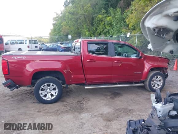 2019 Chevrolet Colorado 4WD LT z VIN 1GCGTCENXK1102429, wystawiony jako IAAI lot #43367648 z przebiegiem 43 773 mil mil oraz . Historia ofert i sprzedaży dostępna na DreamBid. Obrazek 14.