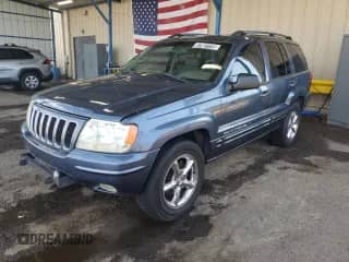 2002 Jeep Grand Cherokee Limited with VIN 1J8GW58JX2C322839, listed as a Copart auction lot 67981115 with 163,606 mi miles and Clean title. Bid and sale history available at DreamBid. Image 1.