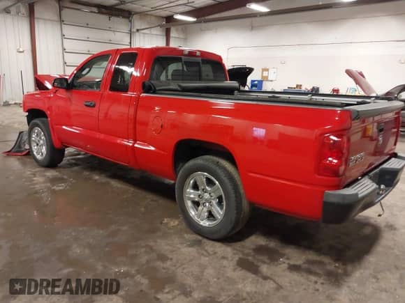 2008 Dodge Dakota SLT with VIN 1D7HW42K78S520323, listed as a IAAI auction lot 42643266 with 200,945 mi miles and . Bid and sale history available at DreamBid. Image 3.