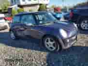 2005 MINI Hardtop with VIN WMWRC33405TC56434, listed as a Copart auction lot 87384035 with 99,950 mi miles and Clean title. Bid and sale history available at DreamBid. Image 4.