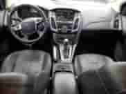 2013 Ford Focus Titanium z VIN 1FADP3J20DL116209, wystawiony jako Copart lot #81394605 z przebiegiem 159 952 mil mil oraz Szkoda całkowita • Salvage title. Historia ofert i sprzedaży dostępna na DreamBid. Obrazek 8.