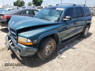 2000 Dodge Durango with VIN 1B4HR28Z5YF242716, listed as a Copart auction lot 65978215 with 184,802 mi miles and Salvage title. Bid and sale history available at DreamBid. Image 1.