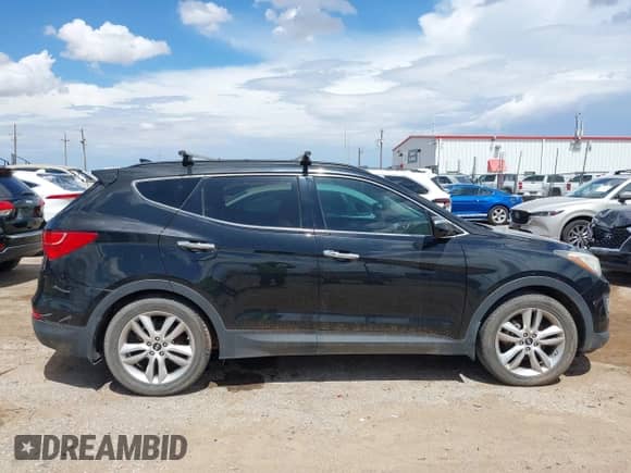 2015 Hyundai Santa Fe with VIN 5XYZW4LA8FG269111, listed as a IAAI auction lot 42599248 with 159,270 mi miles and . Bid and sale history available at DreamBid. Image 13.