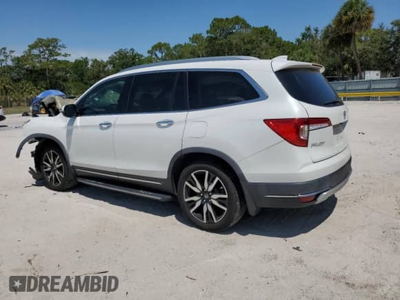 2020 Honda Pilot Touring 7-Passenger с VIN 5FNYF5H60LB012291, выставлен на аукционе Copart как лот 56669745 с пробегом 93 334 миль миль и Списание • Salvage title. История ставок и продаж доступна на DreamBid. Изображение 2.